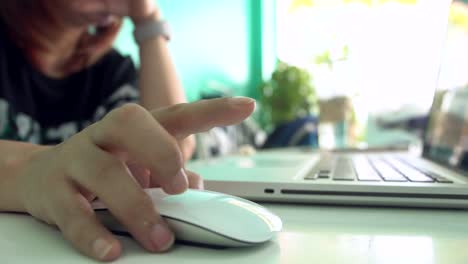 Female-Hand-Using-a-Computer-Mouse-.