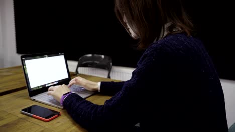 Woman-using-laptop