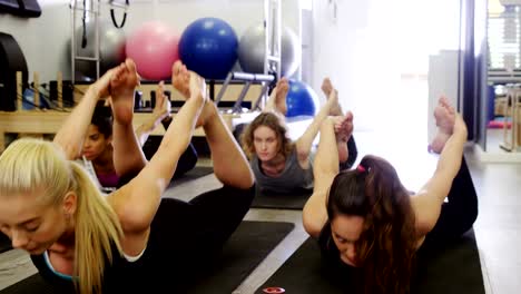 Beautiful-women-exercising-in-fitness-studio