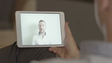 Caucasian-Men-Having-a-Business-Talk-Via-Video-Conference.-Colleagues-Calling-Each-Other-Via-Tablet.