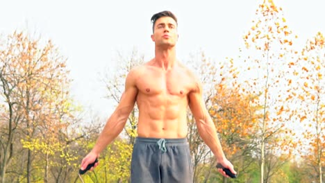 Shirtless-man-practicing-on-a-jumping-rope