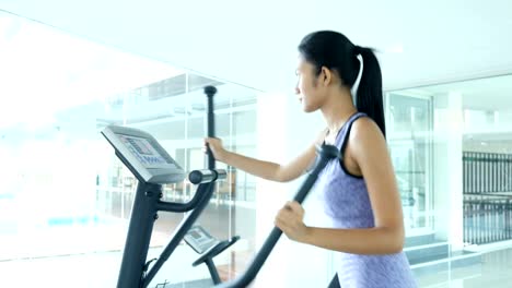 Asian-woman-Exercise-at-gym.-Sport-and-Reaction-concept.-4k-Resolution.