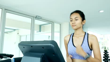 Asian-woman-Exercise-at-gym.-Sport-and-Reaction-concept.-4k-Resolution.