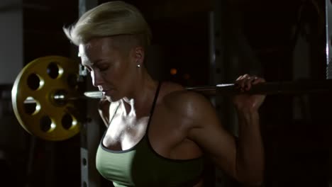 Strong-Woman-Doing-Barbell-Squats