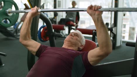 Senior-Man-Doing-Bench-Press-Exercise