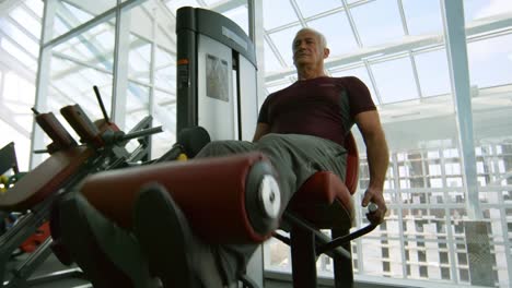 Elderly-Man-on-Leg-Curl-Machine