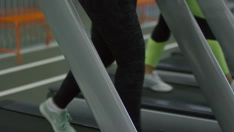 Woman-Having-Fun-on-Treadmill-in-Gym