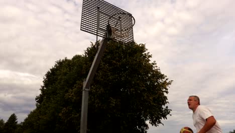 Basketball-player-trains-shot-at-the-basket