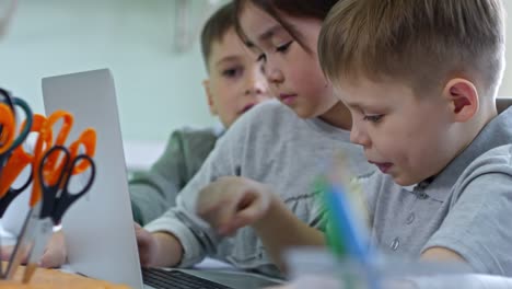 Diverse-Children-Using-Laptop-Computer