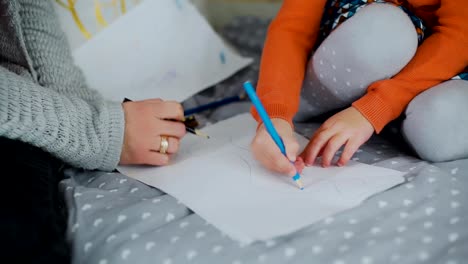 Close-Up-Shot-of-Mother-and-Daughter-Drawing