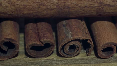 cinnamon-sticks-on-a-wooden-table.-4k