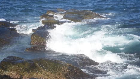 Foaming-and-splashing-wave-in-the-Ocean-with-slow-motion-style,-Sunny-Day-in-Chaojing-Park,-Keelung-City-Taiwan