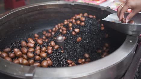 Slow-Motion-cooking-roasted-chestnuts-in-Thailand