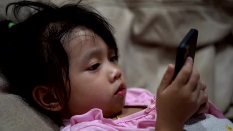 Little-baby-girl-using-smart-phone