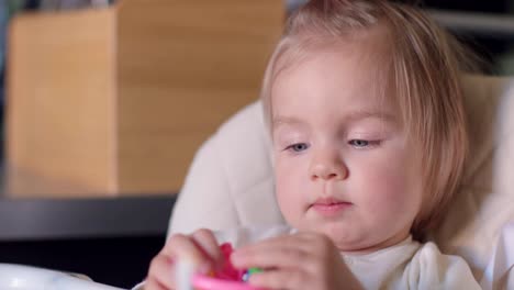 Portrait-of-small-baby-girl-yawning-at-camera