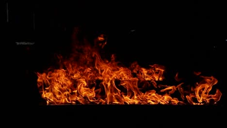 Closeup-of-flames-burning-on-black-background