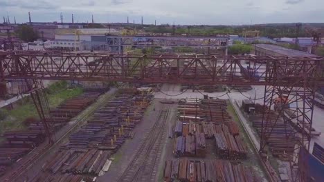 The-gantry-crane-moves-above-the-metal-warehouse