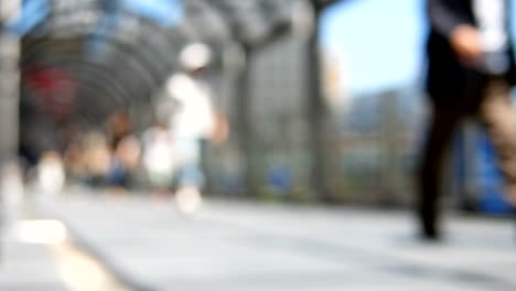 Anonymous-crowd-of-people-walking-on-walk-way-in-rush-hour