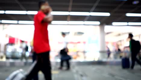 Blur-of-passengers-are-walking-in-terminal-of-airport