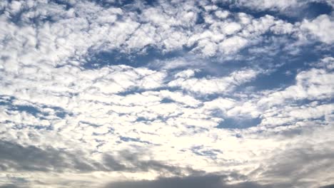 Dramatic-atmosphere-panorama-view-4K-Time-lapse-footage-video-clip-of-blue-sky-and-clouds-on-beautiful-summer-day.