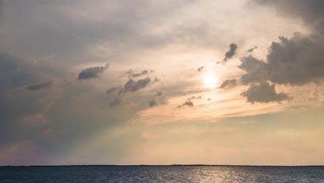 Time-lapse-of-cloudy-sky-with-storm-over-lake