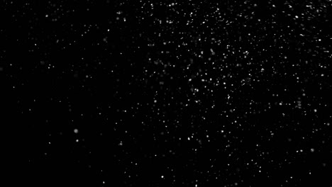 White-Snow-Falling-on-Isolated-Black-Background