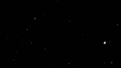 White-Snow-Falling-on-Isolated-Black-Background