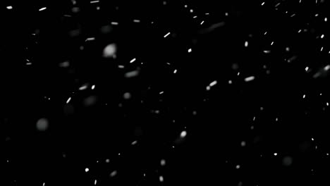 White-Snow-Falling-on-Isolated-Black-Background