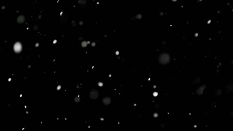 White-Snow-Falling-on-Isolated-Black-Background