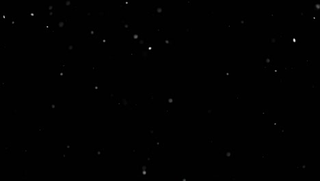 White-Snow-Falling-on-Isolated-Black-Background