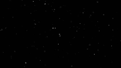 White-Snow-Falling-on-Isolated-Black-Background