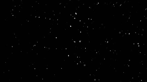 White-Snow-Falling-on-Isolated-Black-Background