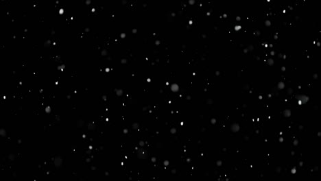 White-Snow-Falling-on-Isolated-Black-Background