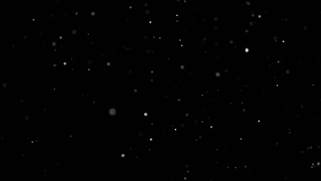 White-Snow-Falling-on-Isolated-Black-Background