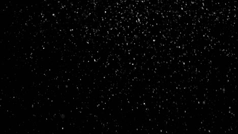 White-Snow-Falling-on-Isolated-Black-Background