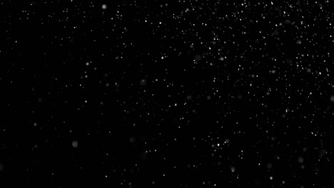 White-Snow-Falling-on-Isolated-Black-Background