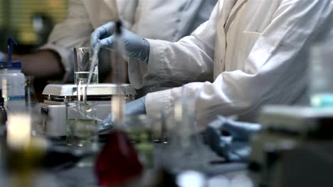 Close-up-of-experiments-being-conducted-in-a-chemistry-lab