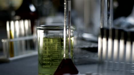 Close-up-shot-of-chemistry-equipment-set-up-on-a-laboratory-table