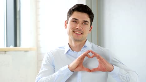 Man-in-Love-with-Heart-Sign,-Indoor