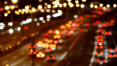 Highway-Traffic-Cars-Driving-at-Multiple-Lane-Speedway-at-Night-Blurred