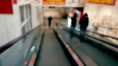 Escalator-of-shopping-mall-with-a-few-people