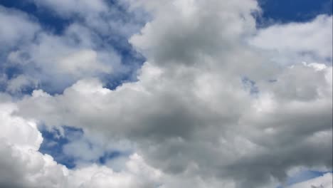 Time-Lapse-of-White-fluffy-clouds-in-the-blue-sky-background