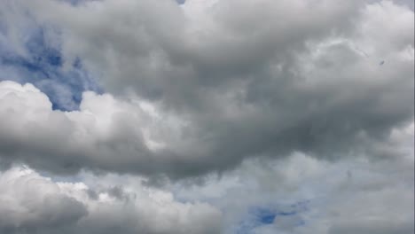 Time-Lapse-of-White-fluffy-clouds-in-the-blue-sky-background