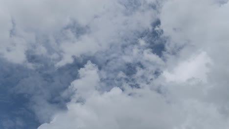 Time-lapse-clip-of-white-clouds-over-blue-sky