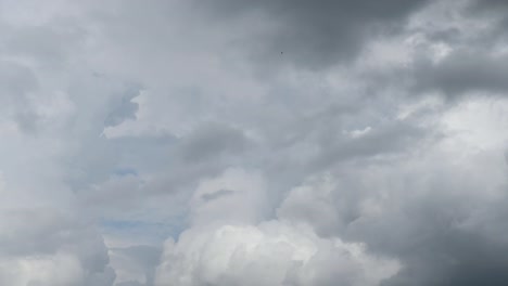 Time-lapse-clip-of-white-clouds-over-blue-sky