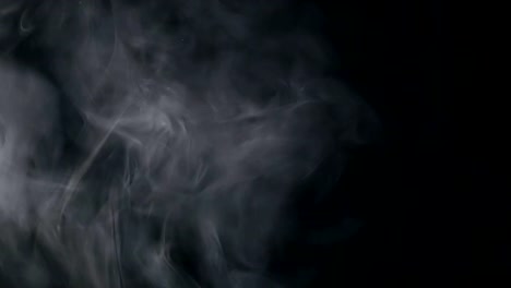 blowing-horizontal-steam-with-white-smoke-rise-in-slow-motion--on-black