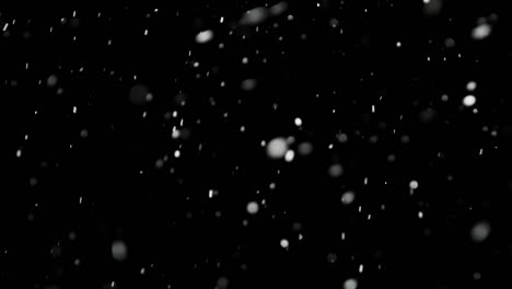 White-Snow-Falling-on-Isolated-Black-Background