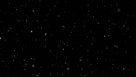 White-Snow-Falling-on-Isolated-Black-Background