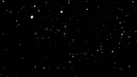 White-Snow-Falling-on-Isolated-Black-Background