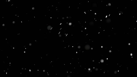 White-Snow-Falling-on-Isolated-Black-Background